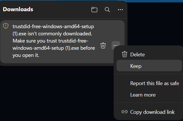 Edge downloads panel warning that the file isn't commonly downloaded, with the Keep option open